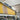 Overhead storage with roll-up banner by BMF at Star Building Materials