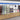 Pet store interior with accessories displaying leashes and collars.
